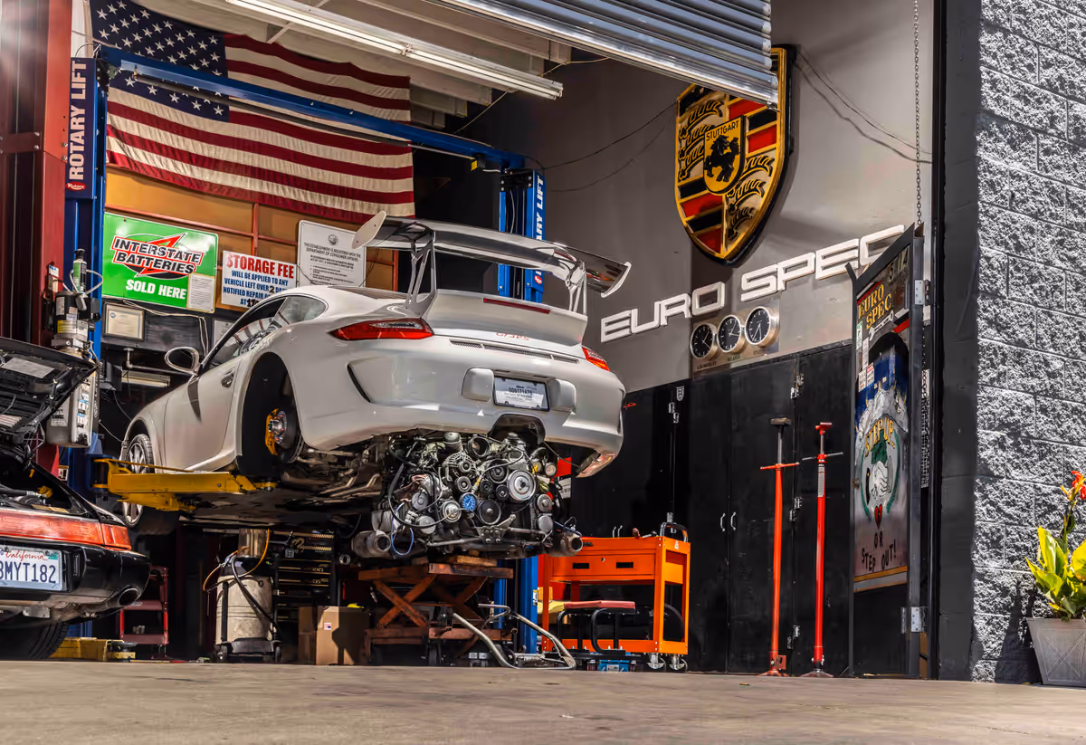 Porsche raised on a lift in the Euro Spec Motoring workshop